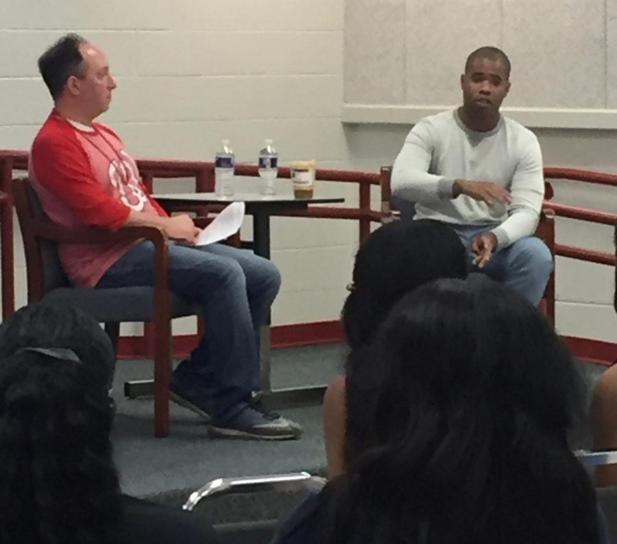 Jeffrey Alston (left) advises students about his career 