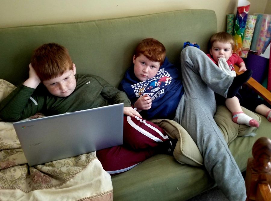 The Warren boys blend distance learning with occasional mischief.