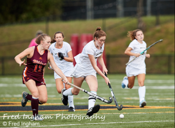The girls Varsity field hockey team playing against Mountain View. 