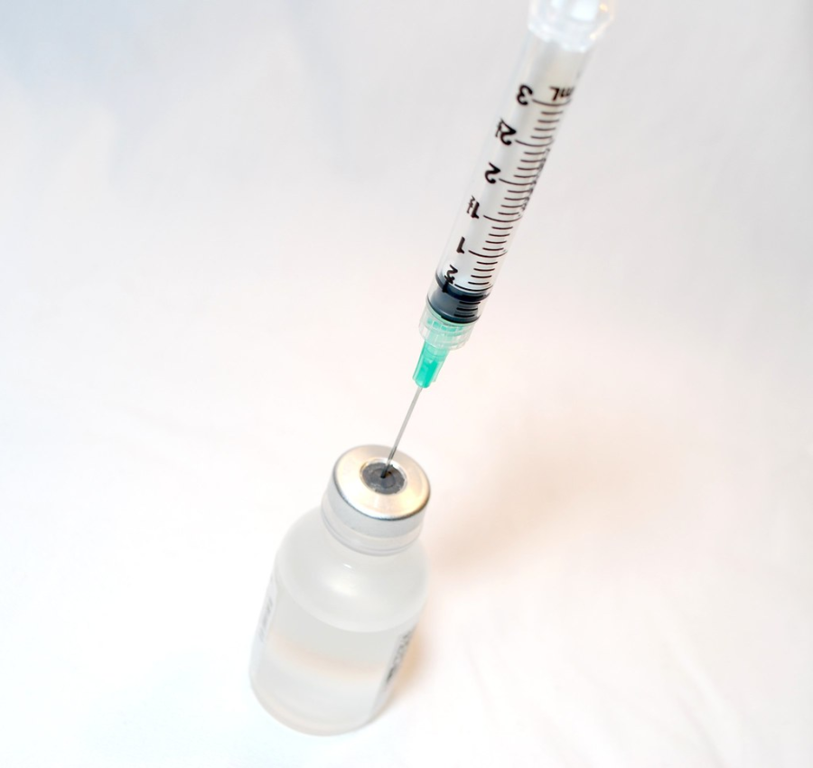 Syringe and vaccine.