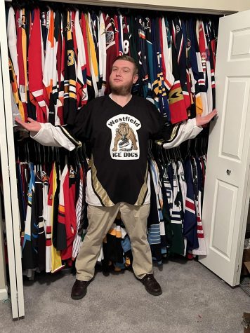 Baranowski with his 371 hockey jerseys.