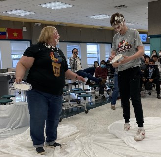 Christy Jenkins-Dietz(left) and Michael Manser(right), after the Math Honors Societys Pi Day celebration.