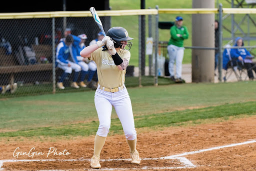 Izzy Lalli, 11, hits the game winning RBI in the eighth inning. 
