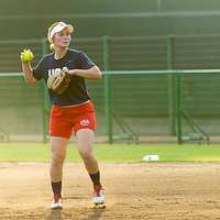 United States Olympic Softball silver medalist Ali Aguilar winds up to throw a ball. 